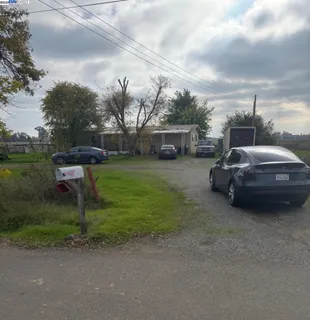a view of a car in front of house