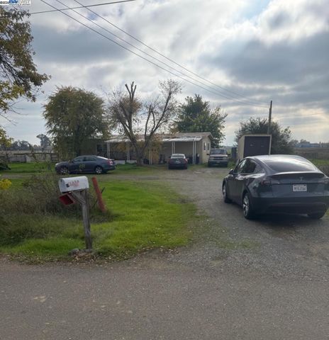 a view of a car in front of house
