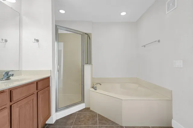 a view of storage and utility room with racks on the wall