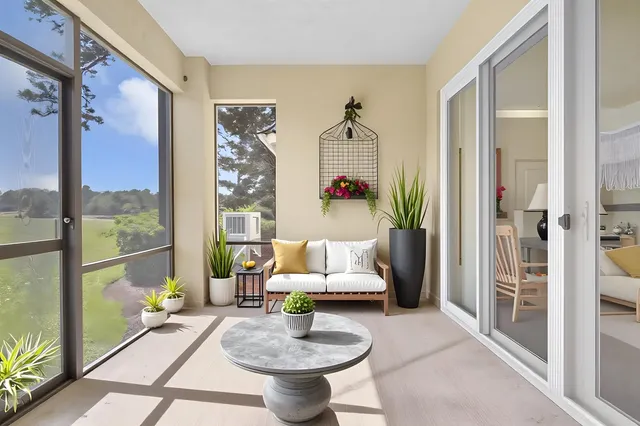 a view of a room with yard from a windows