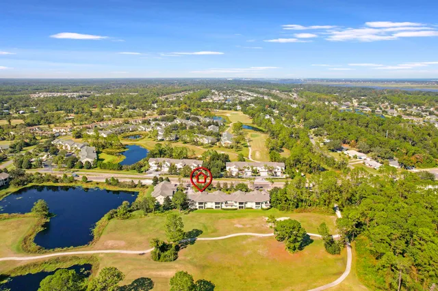 a view of an ocean and city