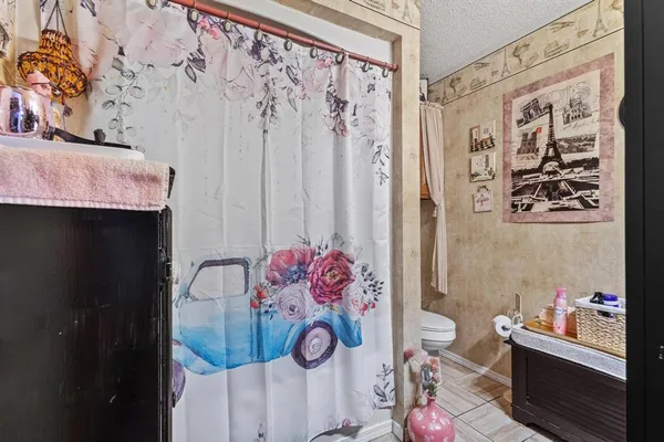 a room with toys and wall painting on the wall