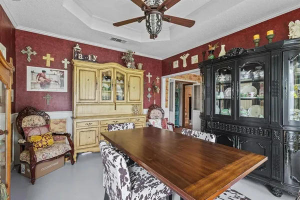 a view of a dining room with furniture