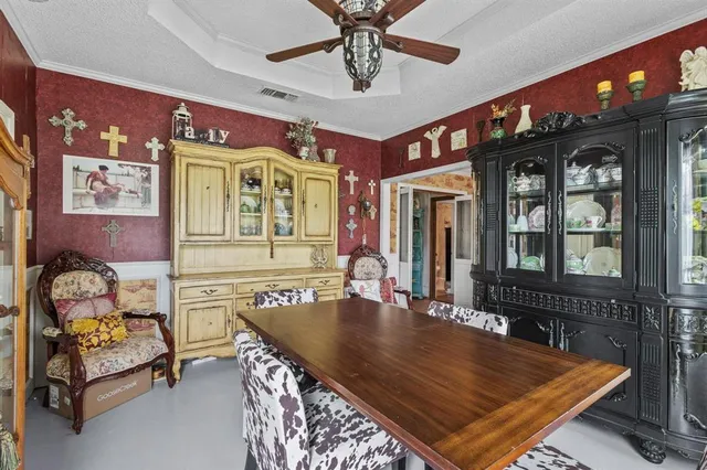 a view of a dining room with furniture