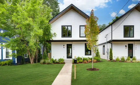 a view of a yard in front of house
