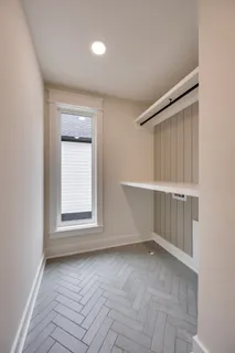 an empty room with windows