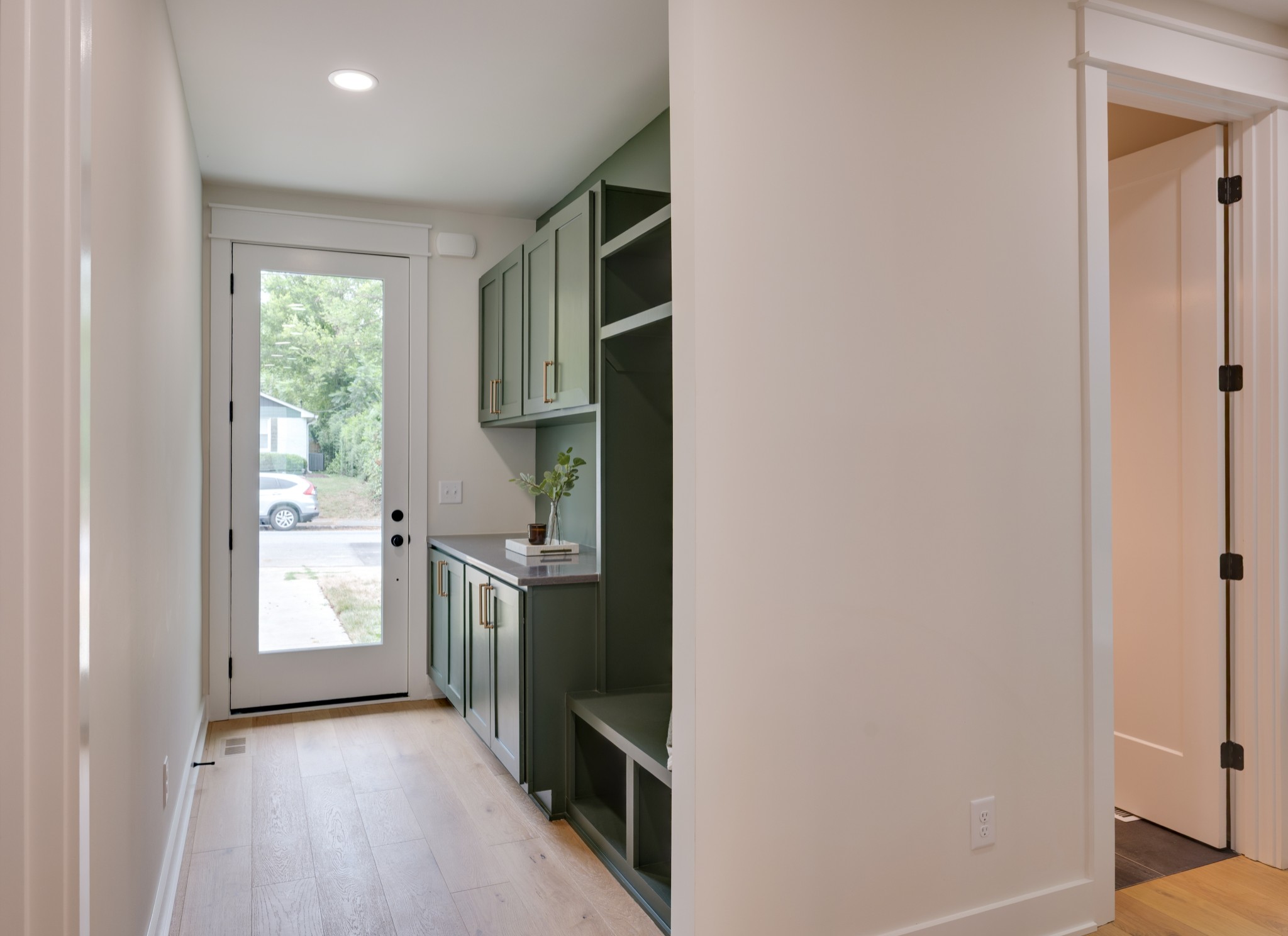 704 Stockell Street Nashville, TN 37207 - Photo 3 of 32 a kitchen with a refrigerator and a stove