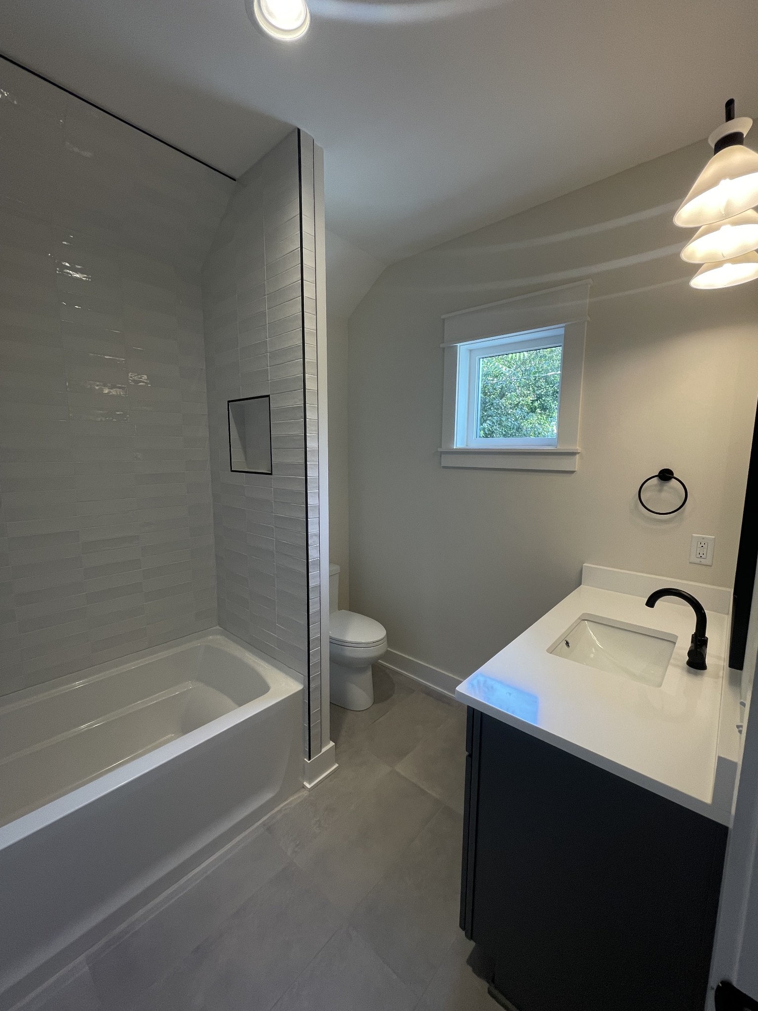 704 Stockell Street Nashville, TN 37207 - Photo 31 of 32 a bathroom with a sink a toilet and shower