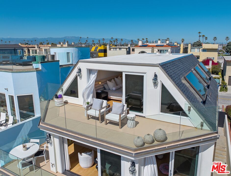 3521 Ocean Drive Oxnard, CA 93035 - Photo 23 of 53 a view of house with outdoor space and seating