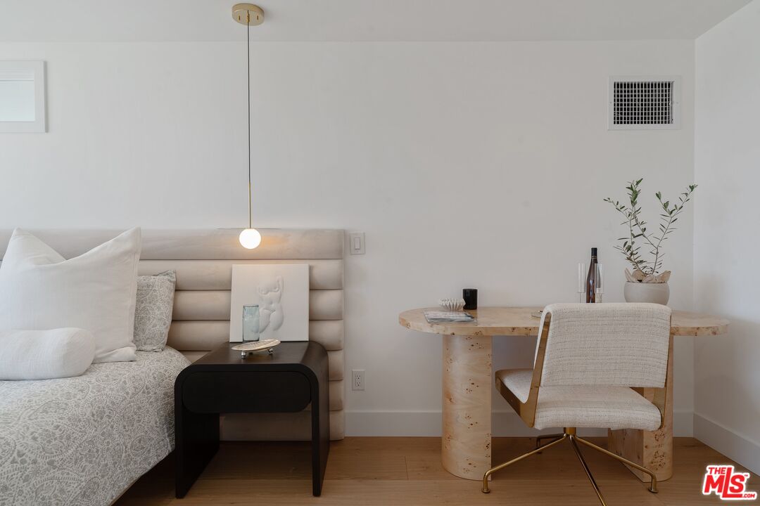 3521 Ocean Drive Oxnard, CA 93035 - Photo 25 of 53 a work room with furniture and a lamp