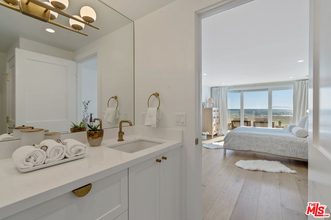 3521 Ocean Drive Oxnard, CA 93035 - Photo 26 of 53 a bedroom with furniture and a window