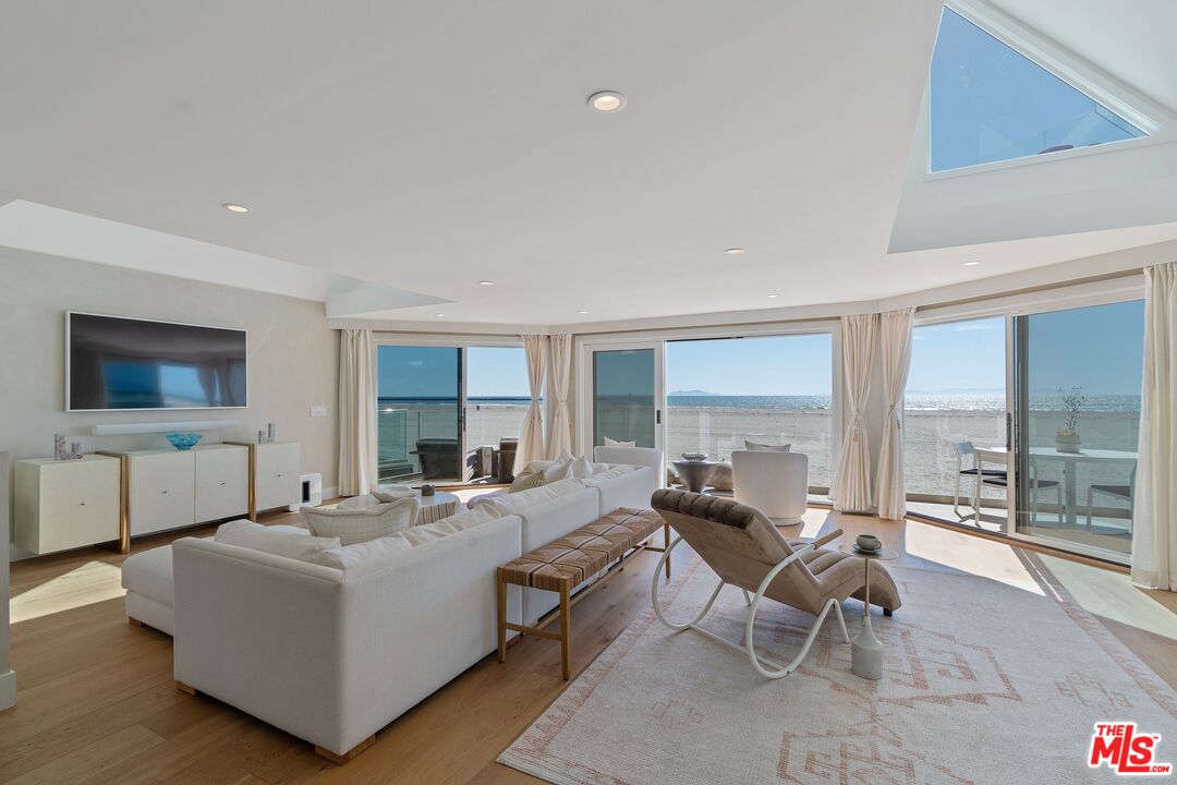 3521 Ocean Drive Oxnard, CA 93035 - Photo 4 of 53 a living room with furniture and a flat screen tv