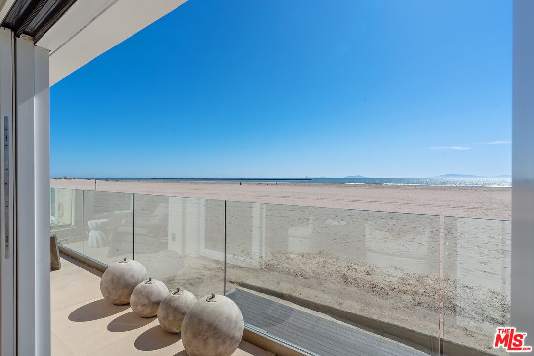 3521 Ocean Drive Oxnard, CA 93035 - Photo 41 of 53 a bathroom with a granite countertop sink and a mirror