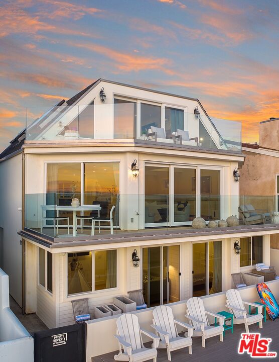 3521 Ocean Drive Oxnard, CA 93035 - Photo 49 of 53 a front view of a building with glass windows