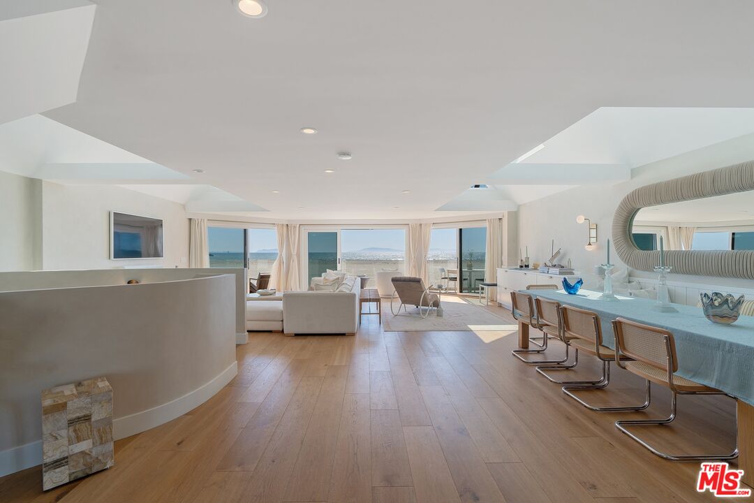 3521 Ocean Drive Oxnard, CA 93035 - Photo 5 of 53 a living room with furniture and a wooden floor