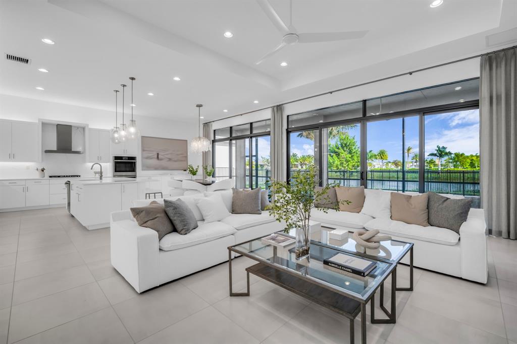 11242 Gln Orch Lane Boynton Beach, FL 33473 - Photo 18 of 55 a living room with furniture and a large window