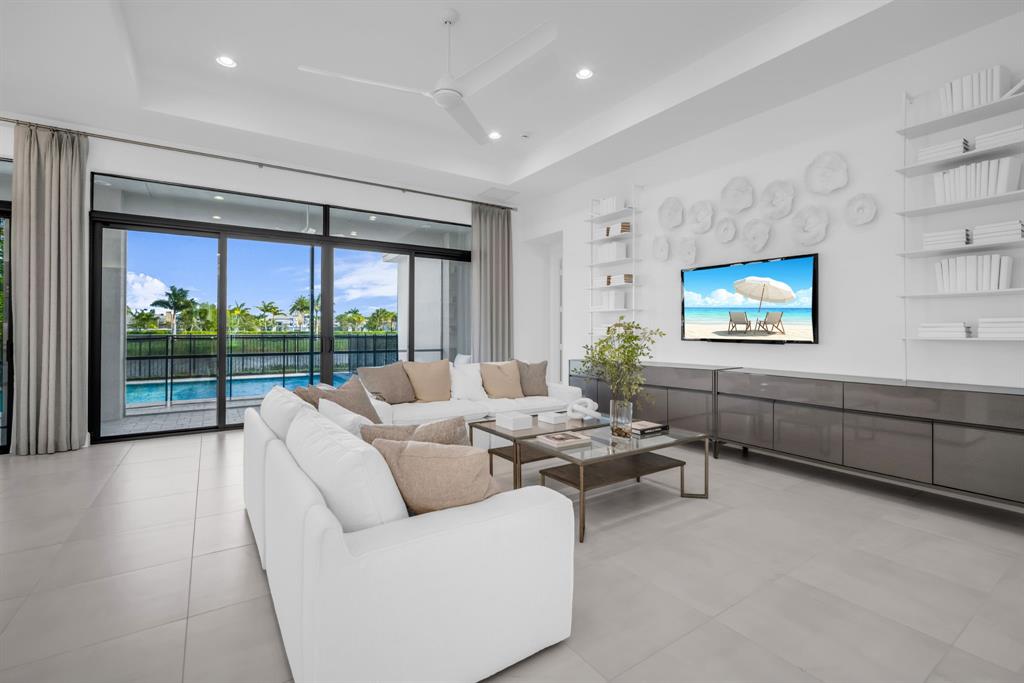 11242 Gln Orch Lane Boynton Beach, FL 33473 - Photo 19 of 55 a living room with furniture and a large window