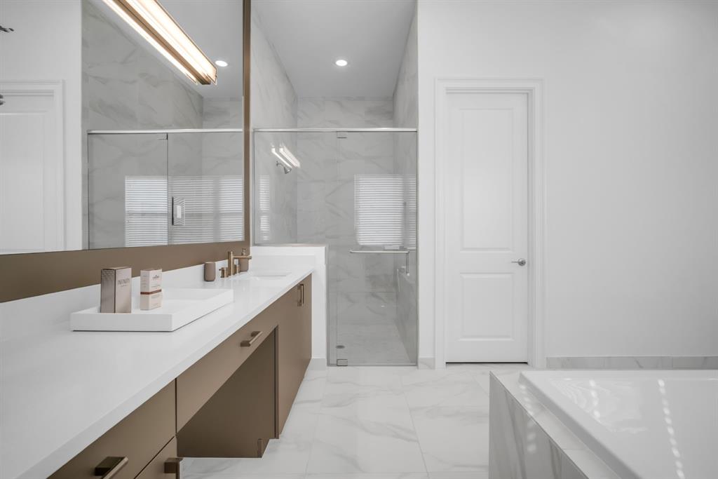 11242 Gln Orch Lane Boynton Beach, FL 33473 - Photo 28 of 55 a bathroom with a double vanity sink and mirror