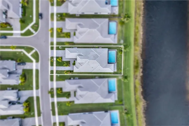 a view of a lake with a big yard