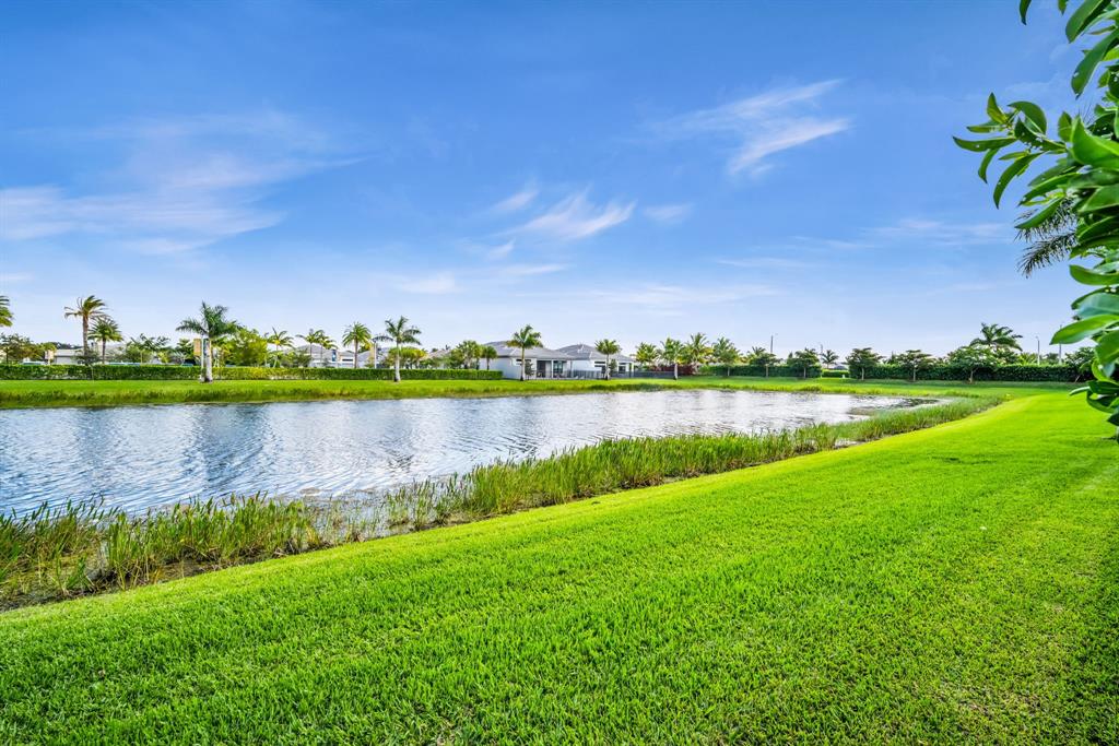 11242 Gln Orch Lane Boynton Beach, FL 33473 - Photo 55 of 55 a view of a lake with a big yard