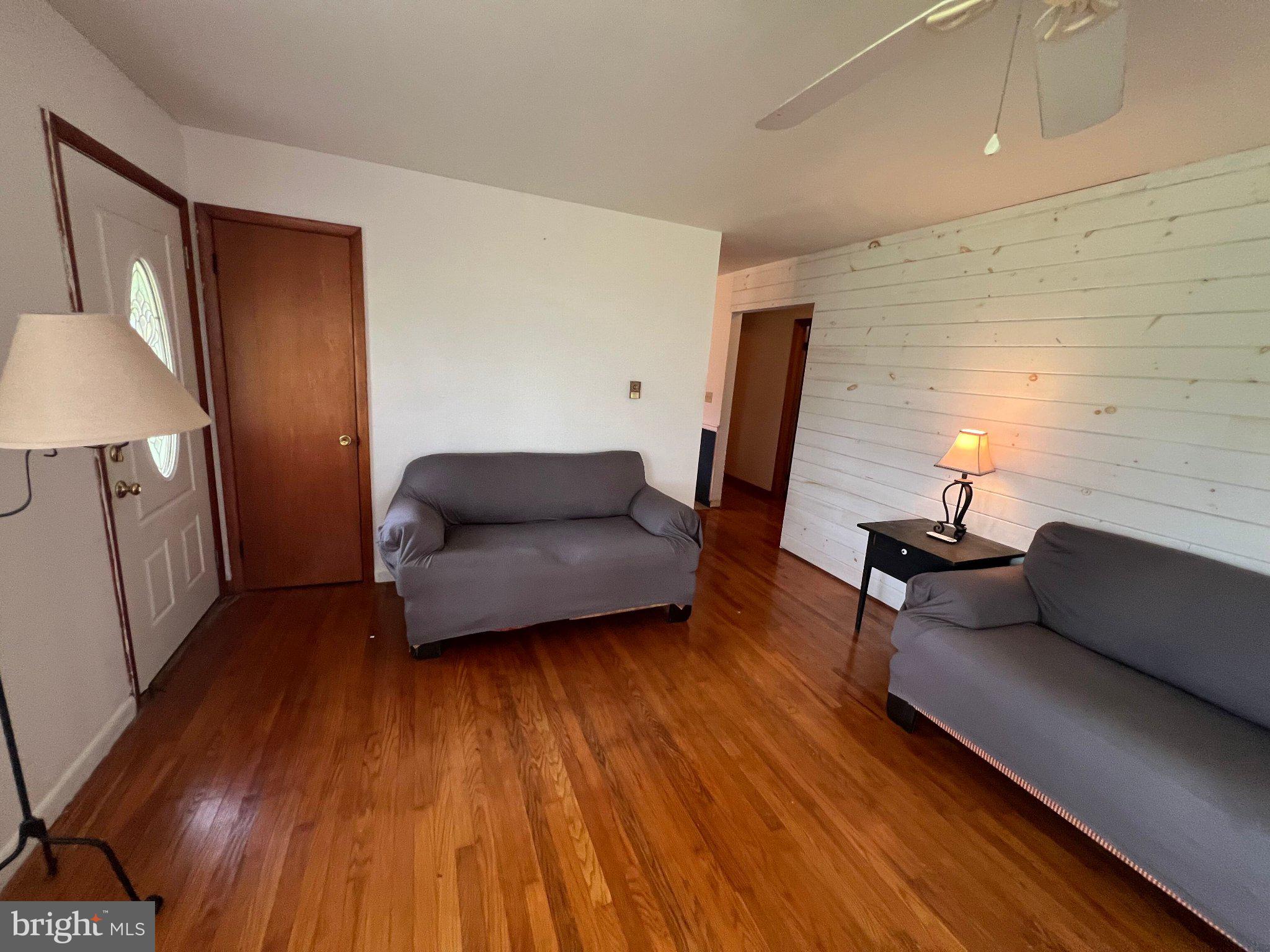 381 Co Rte 7/1 Augusta, WV 26704 - Photo 27 of 42 Cozy living space with warm wood floors.