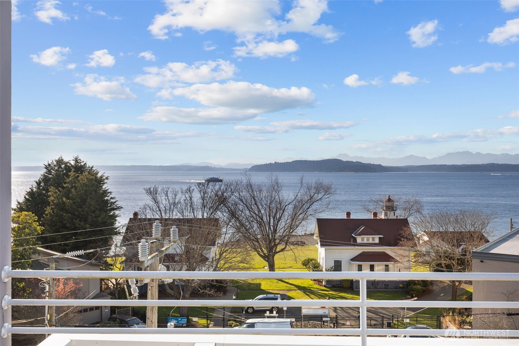 3200 Alki Avenue Southwest, Unit 301 Seattle, WA 98116 - Photo 1 of 29 a view of building with an outdoor space