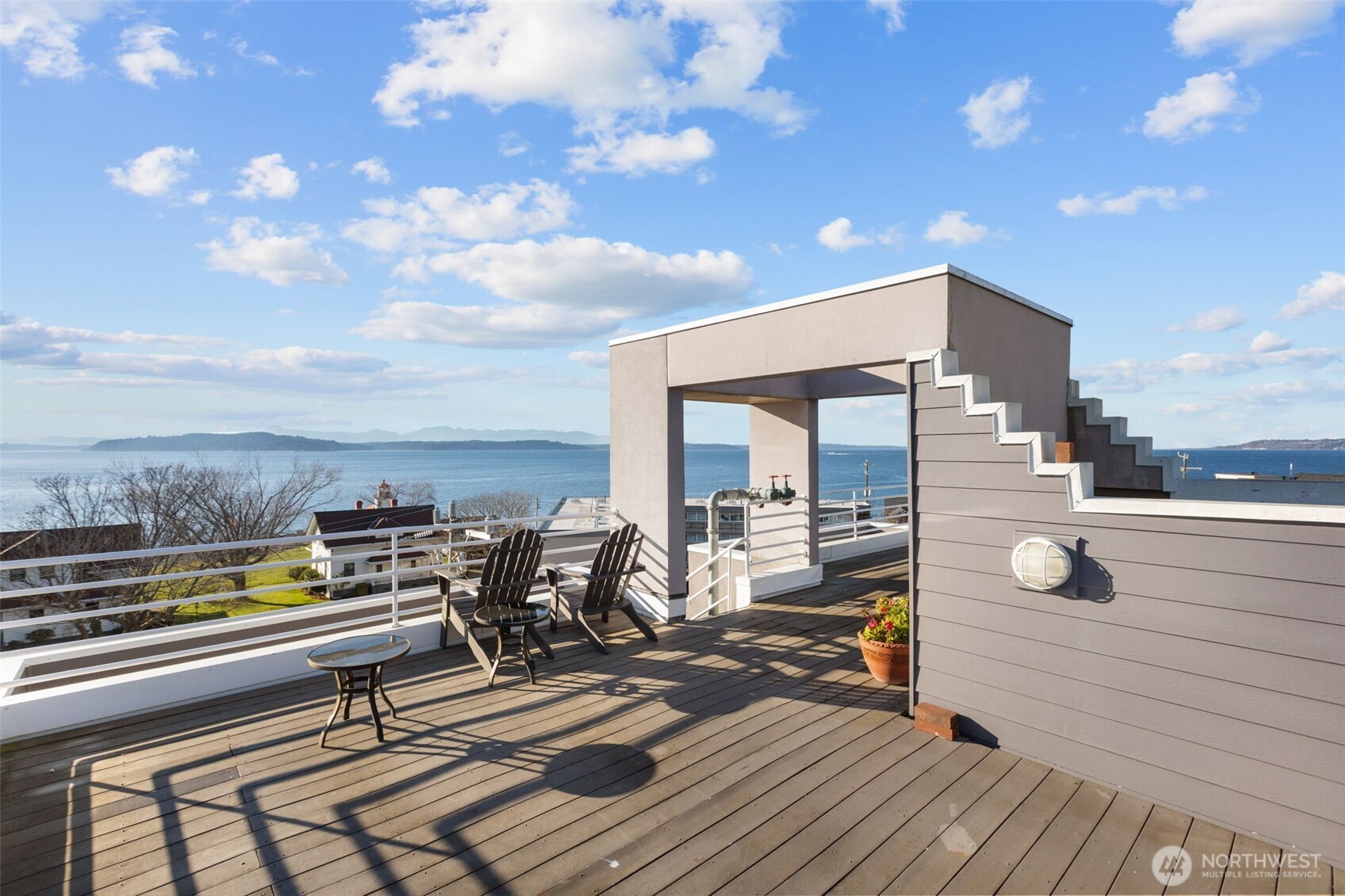 3200 Alki Avenue Southwest, Unit 301 Seattle, WA 98116 - Photo 22 of 29 a view of a terrace with seating area