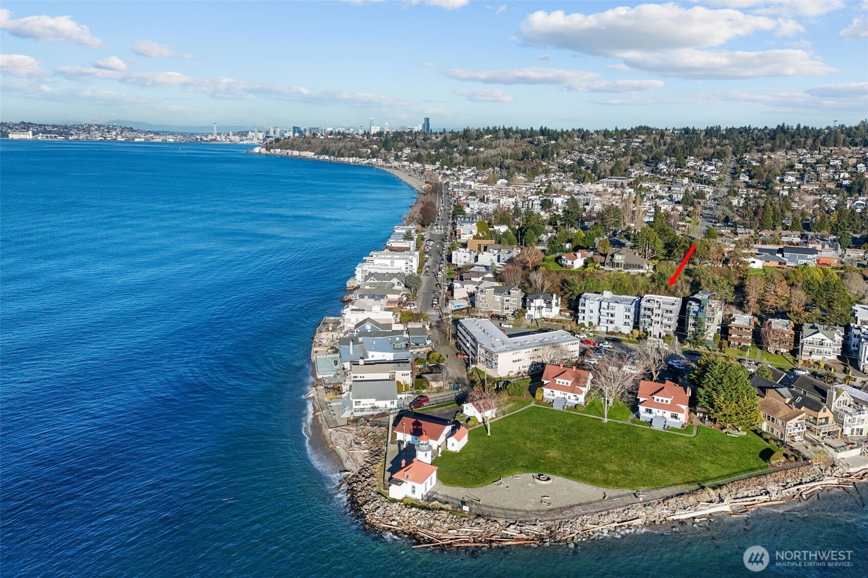 3200 Alki Avenue Southwest, Unit 301 Seattle, WA 98116 - Photo 25 of 29 a view of a swimming pool in a back yard
