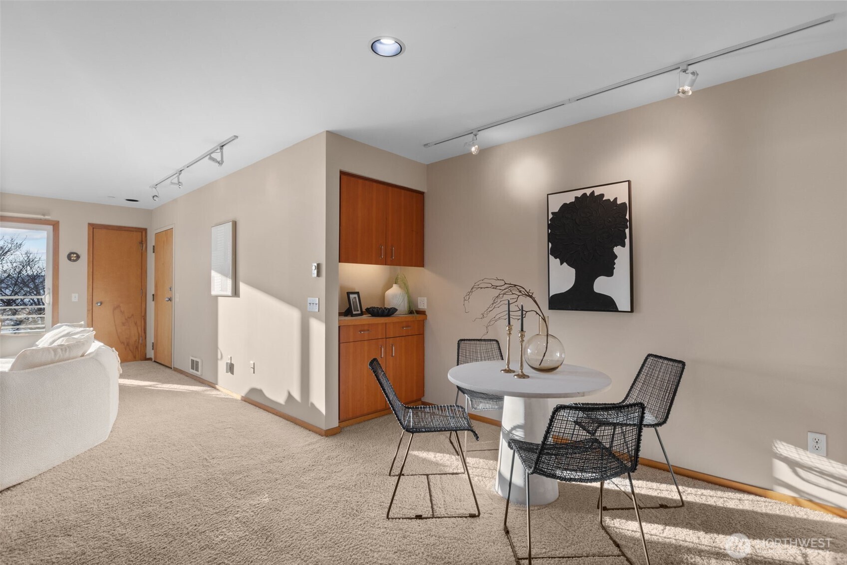 3200 Alki Avenue Southwest, Unit 301 Seattle, WA 98116 - Photo 7 of 29 a view of a livingroom with furniture and windows