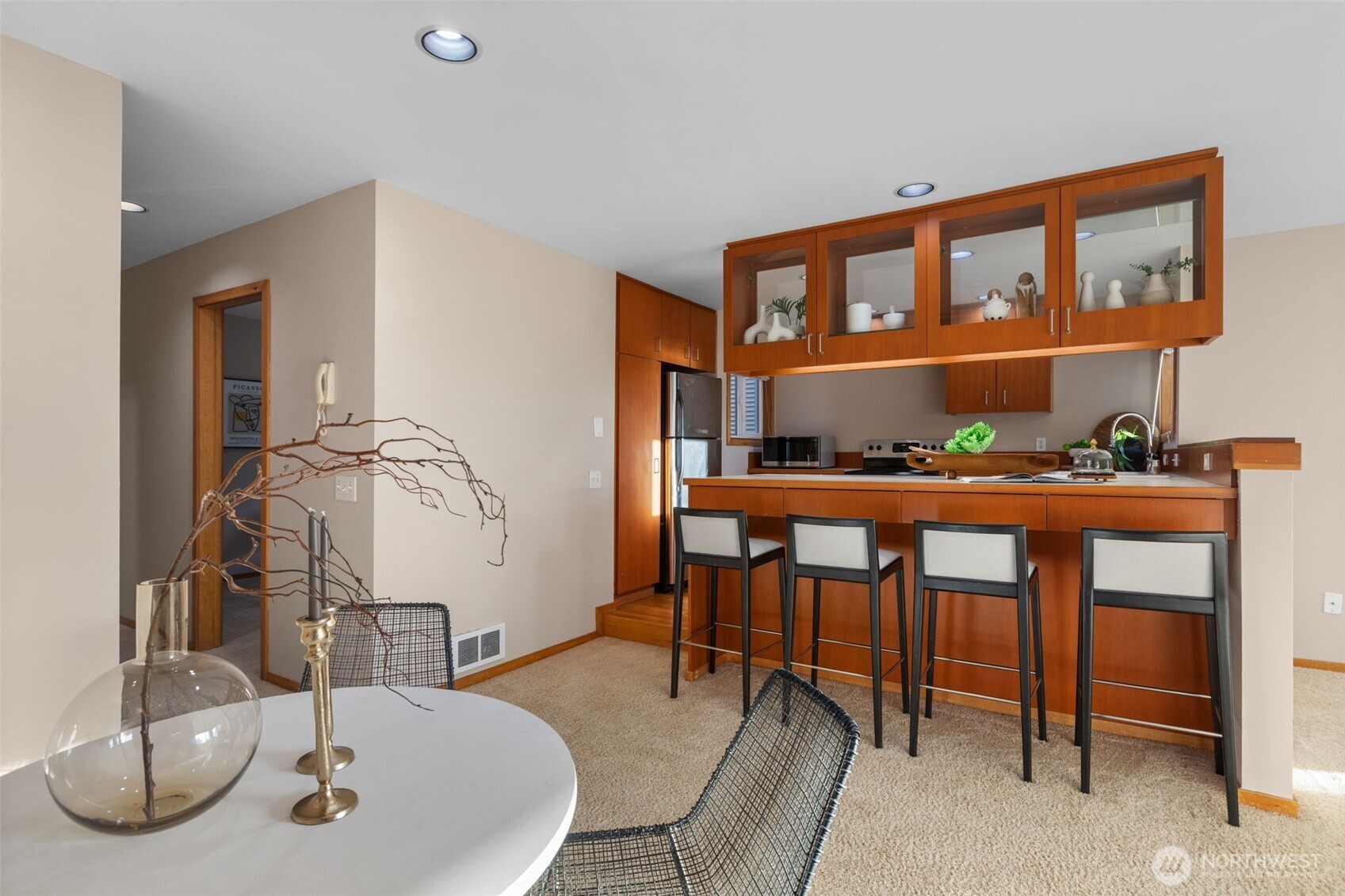 3200 Alki Avenue Southwest, Unit 301 Seattle, WA 98116 - Photo 9 of 29 a dining room with furniture and a window