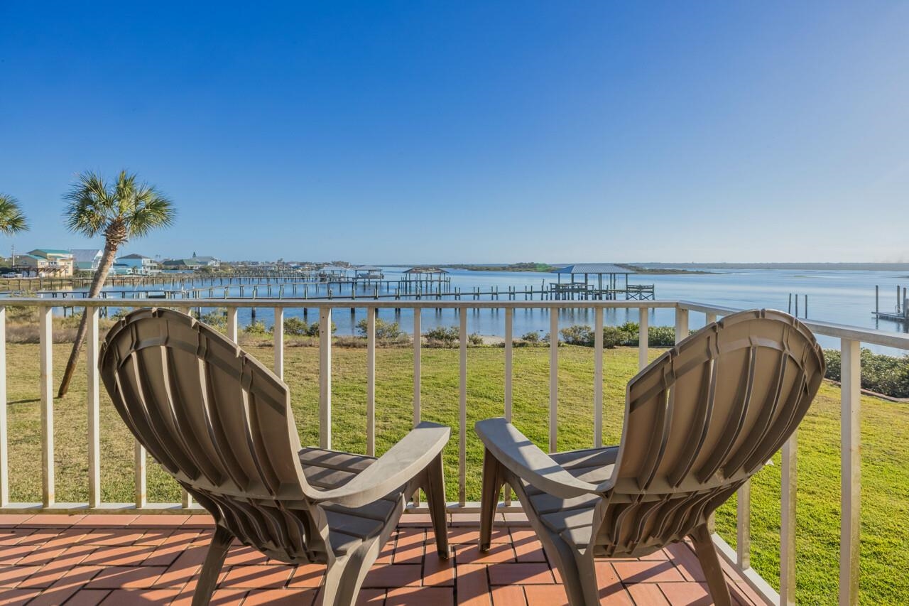 7265 A1A South, Unit B3 St. Augustine, FL 32080 - Photo 1 of 45 a view of a swimming pool with chair and table