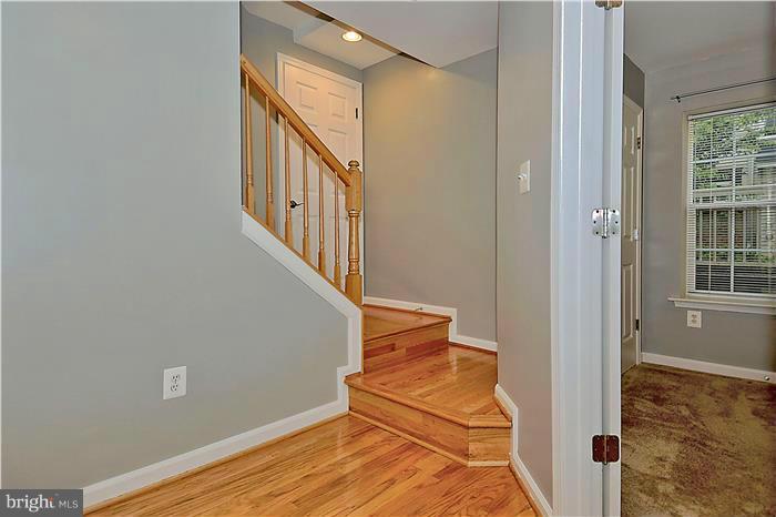 11349 King George Drive, Unit 10 Silver Spring, MD 20902 - Photo 14 of 20 a view of an entryway with wooden floor