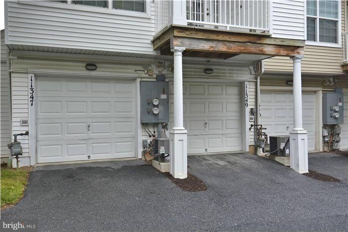 11349 King George Drive, Unit 10 Silver Spring, MD 20902 - Photo 4 of 20 a view of a house with garage