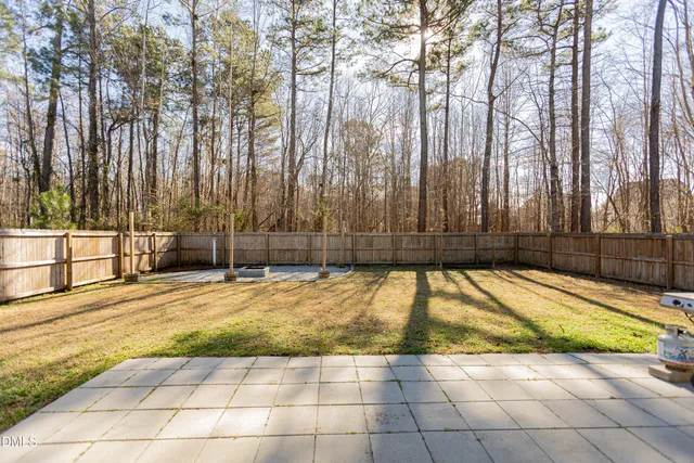 a view of a swimming pool with an outdoor space and seating area