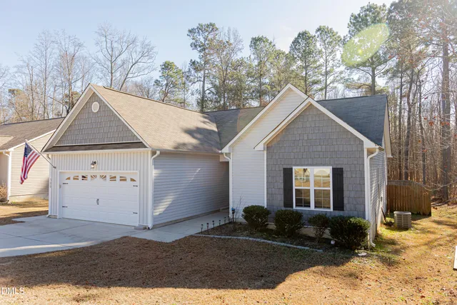 a view of outdoor space yard and garage
