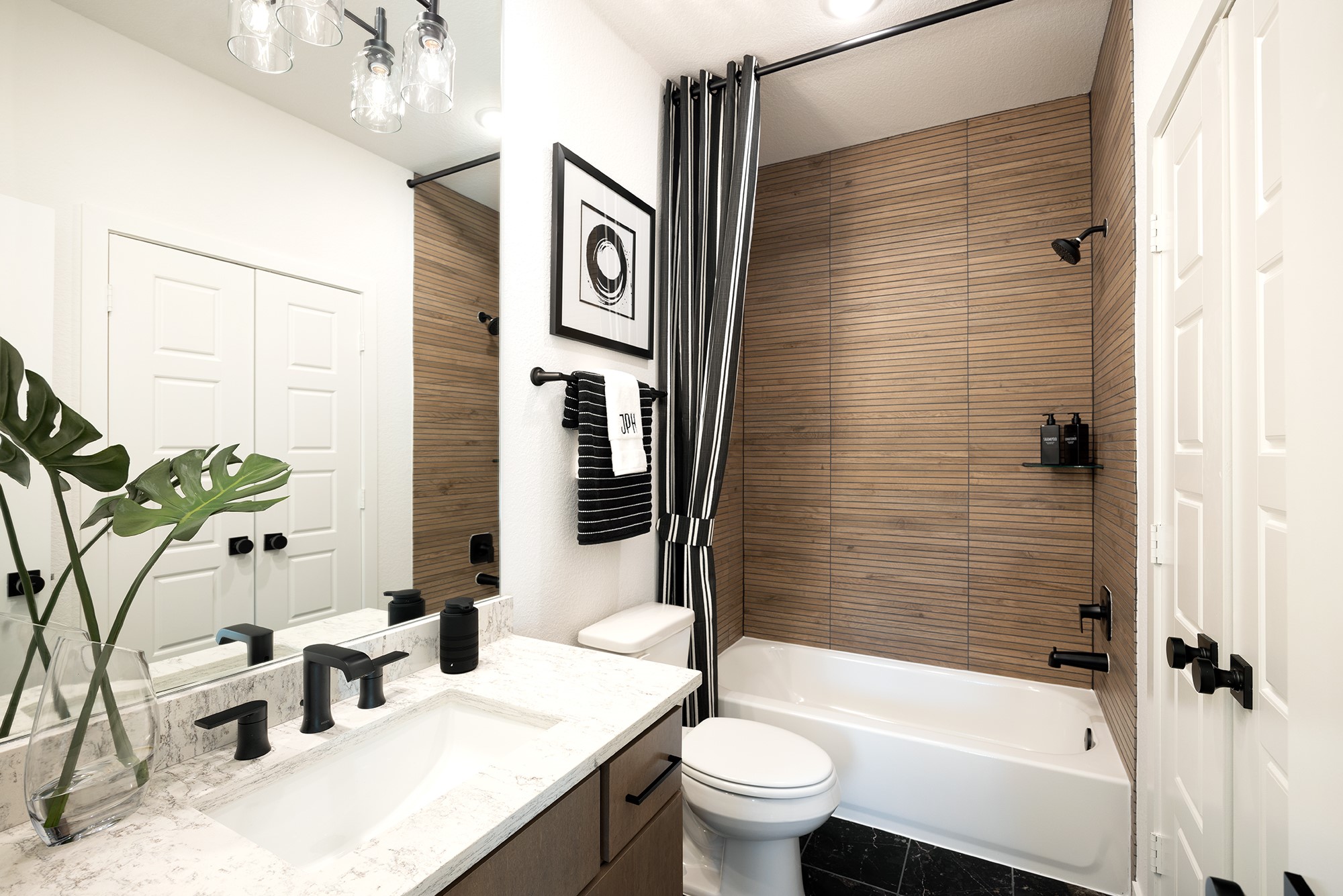 41885 Wendele Way Montgomery, TX 77316 - Photo 16 of 27 a bathroom with a sink a toilet and shower