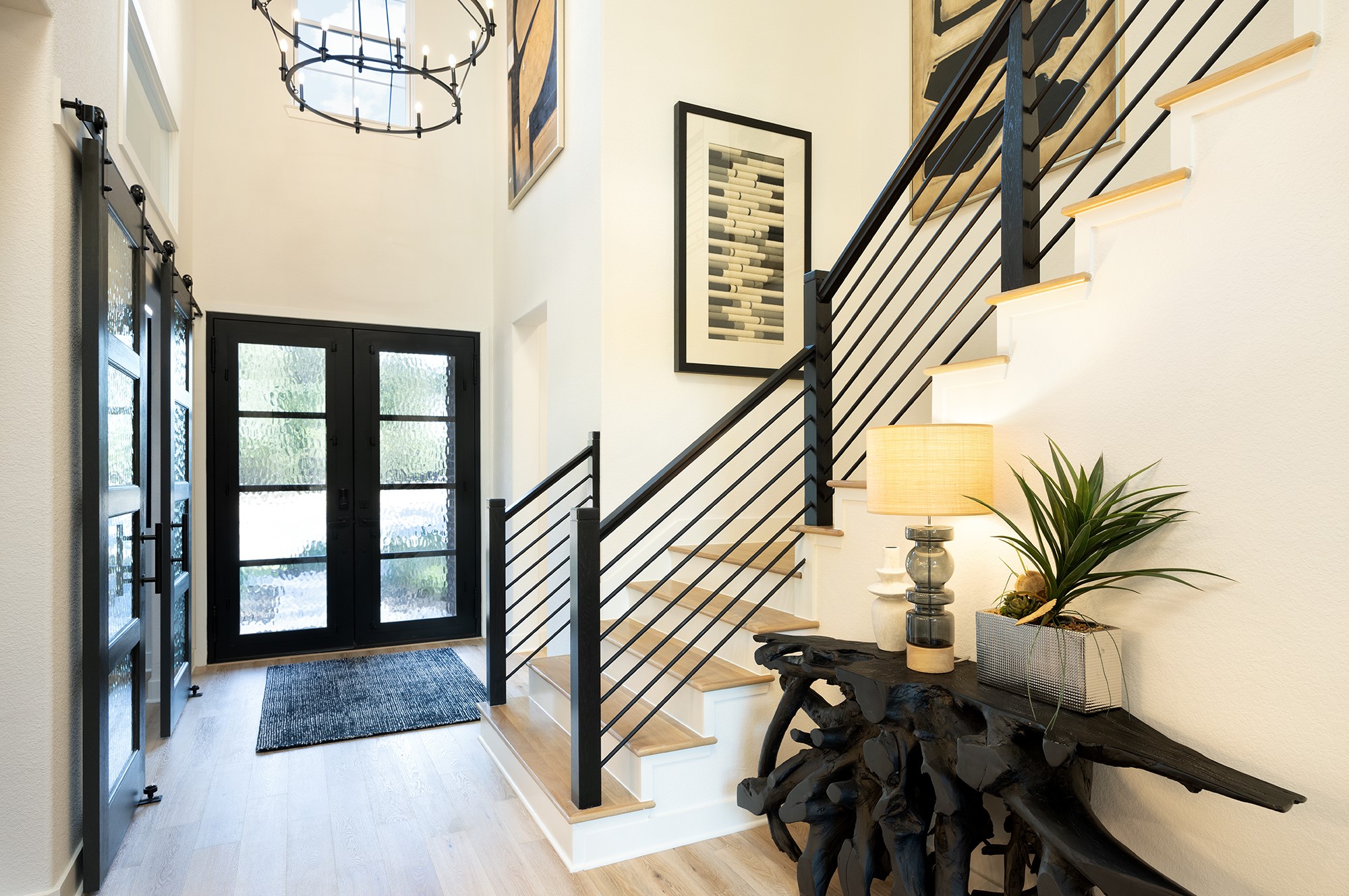 41885 Wendele Way Montgomery, TX 77316 - Photo 2 of 27 a view of stairs and hall with wooden floor