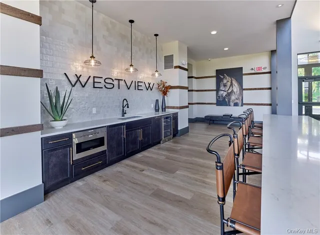 a room with furniture and wooden floor