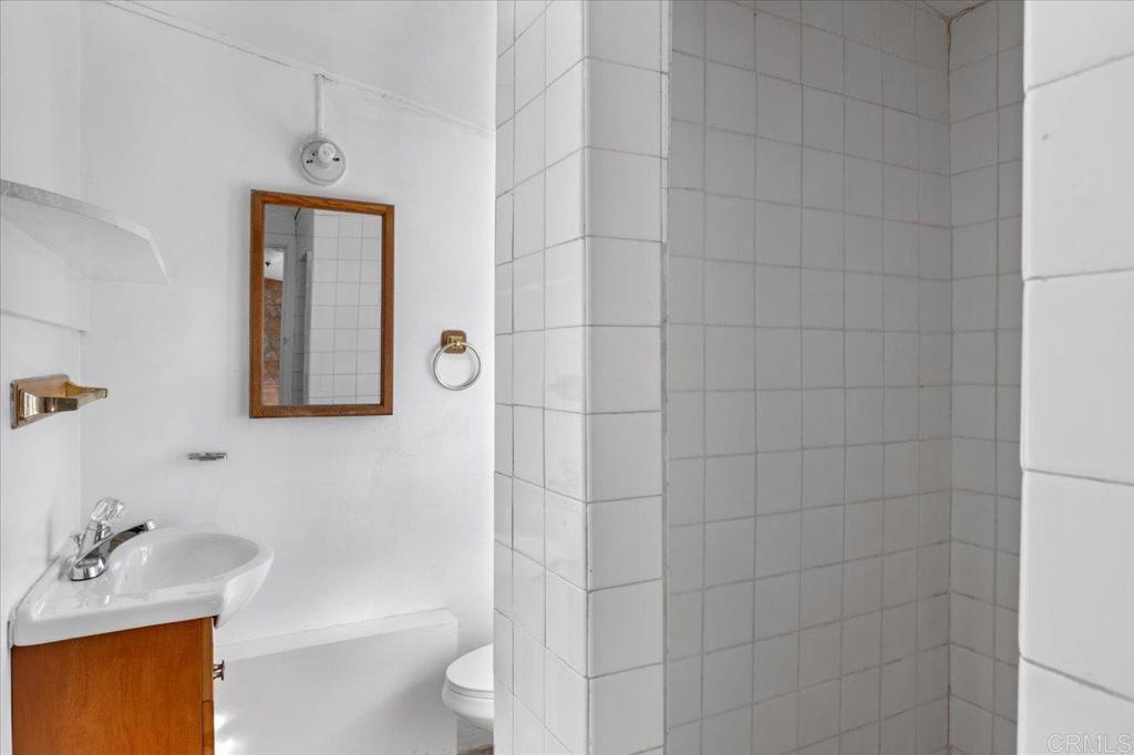 34174 Hampton Road Pauma Valley, CA 92061 - Photo 13 of 20 a bathroom with a sink toilet and shower