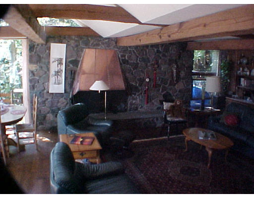 50 Quincy Road Newton, MA 02467 - Photo 5 of 7 a living room with furniture and a fireplace