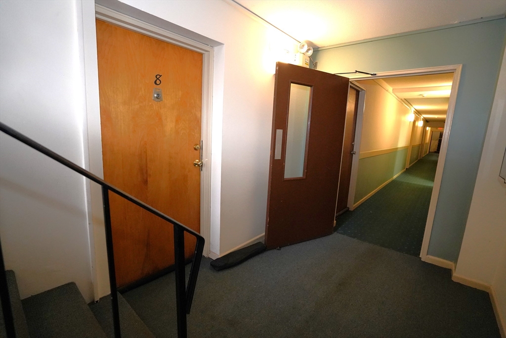140 Kenrick Street, Unit 8 Boston, MA 02135 - Photo 11 of 16 a view of walk in closet