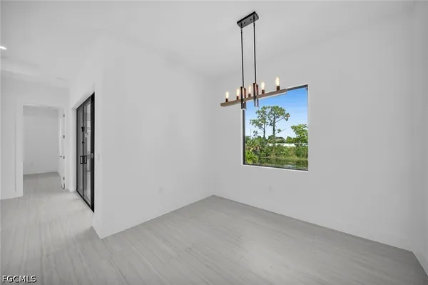 a view of an empty room and window