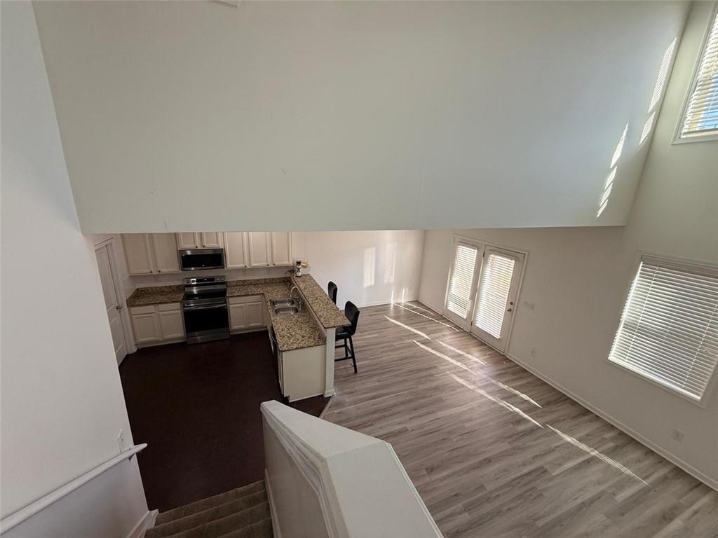 2450 Oakleaf Circle Lithonia, GA 30058 - Photo 26 of 40 a living room with furniture and a wooden floor