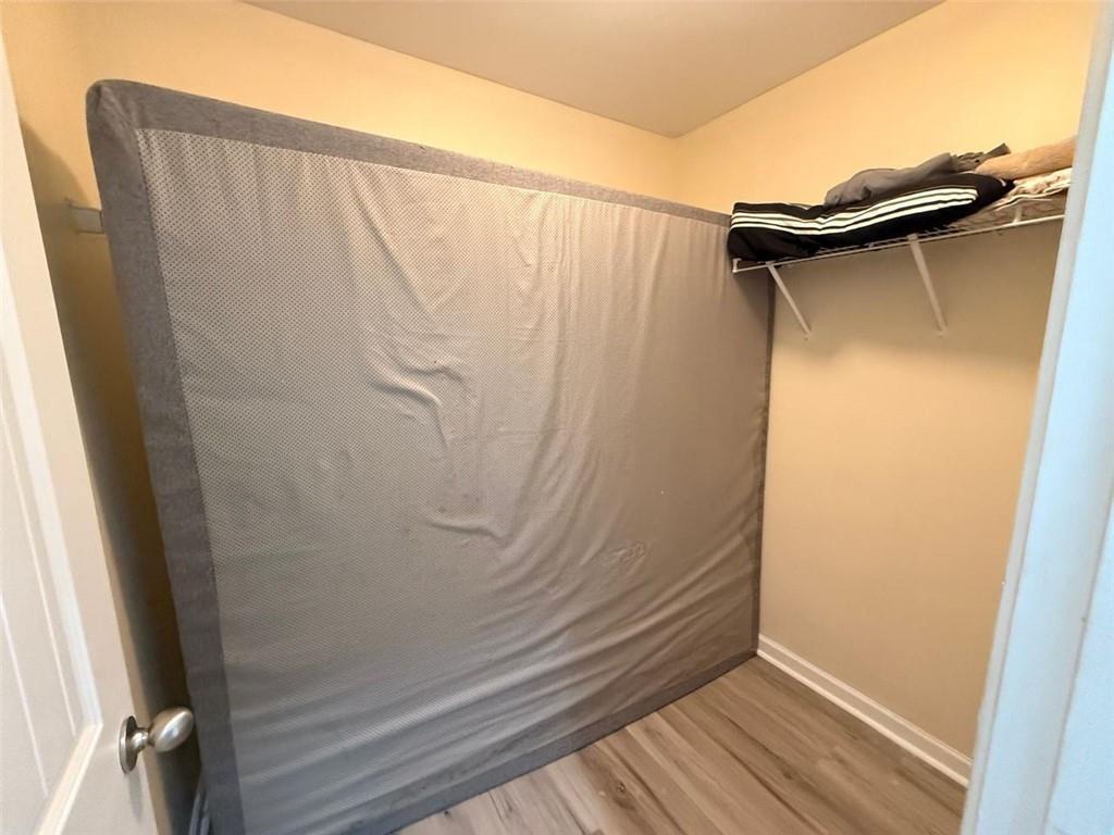 2450 Oakleaf Circle Lithonia, GA 30058 - Photo 32 of 40 a bathroom with a shower and a window
