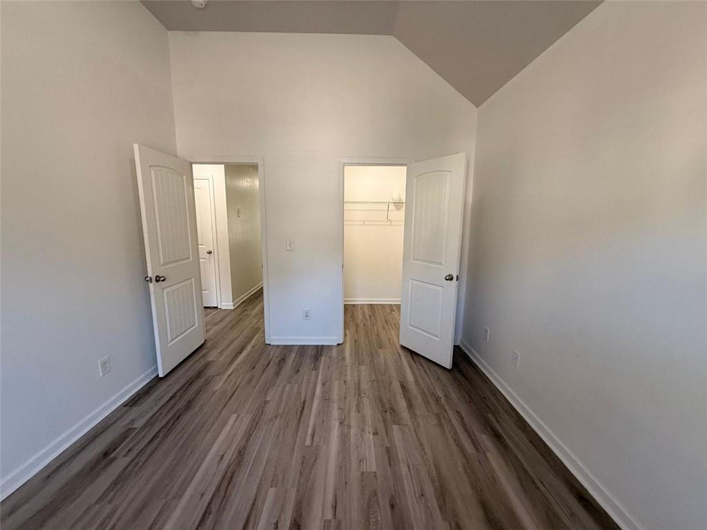 2450 Oakleaf Circle Lithonia, GA 30058 - Photo 39 of 40 a view of a room with wooden floor and white walls