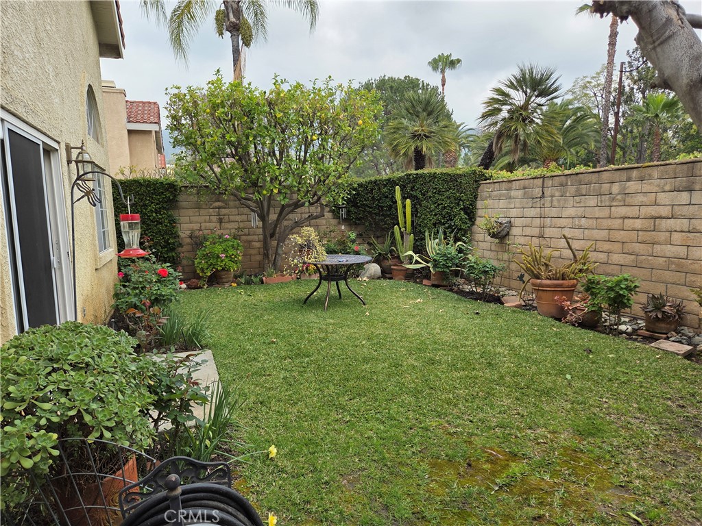 1330 Meadow Lane Duarte, CA 91010 - Photo 13 of 15 a backyard of a house with a garden and plants