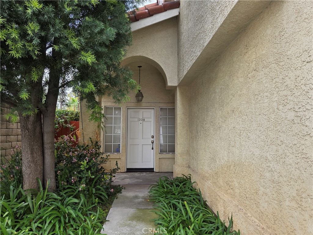 1330 Meadow Lane Duarte, CA 91010 - Photo 2 of 15 a front view of a house with trees