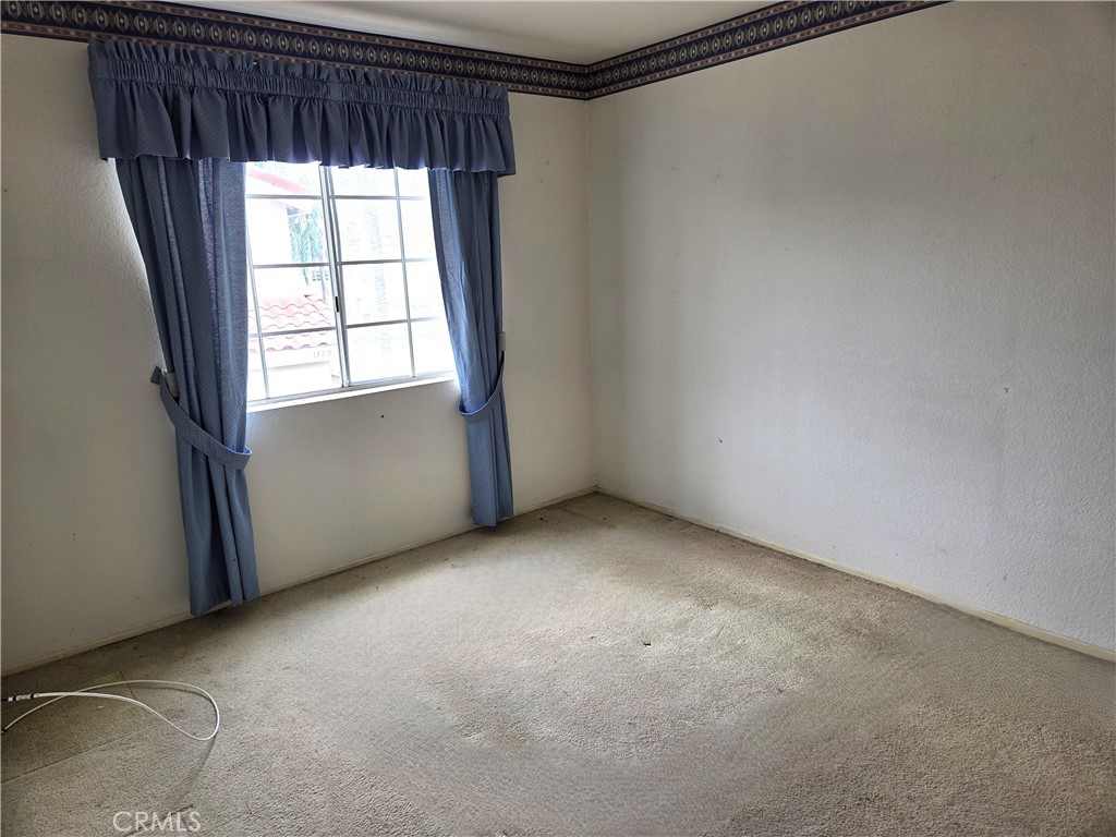 1330 Meadow Lane Duarte, CA 91010 - Photo 9 of 15 an empty room with a window