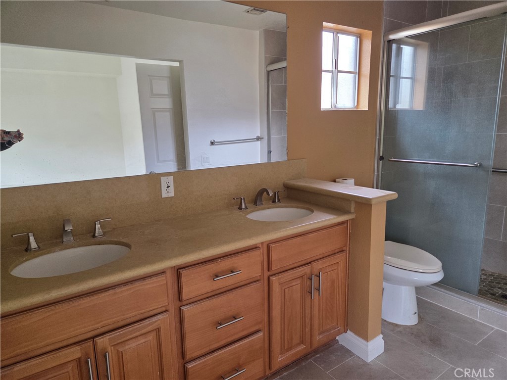1330 Meadow Lane Duarte, CA 91010 - Photo 10 of 15 a bathroom with 2 sink and a toilet