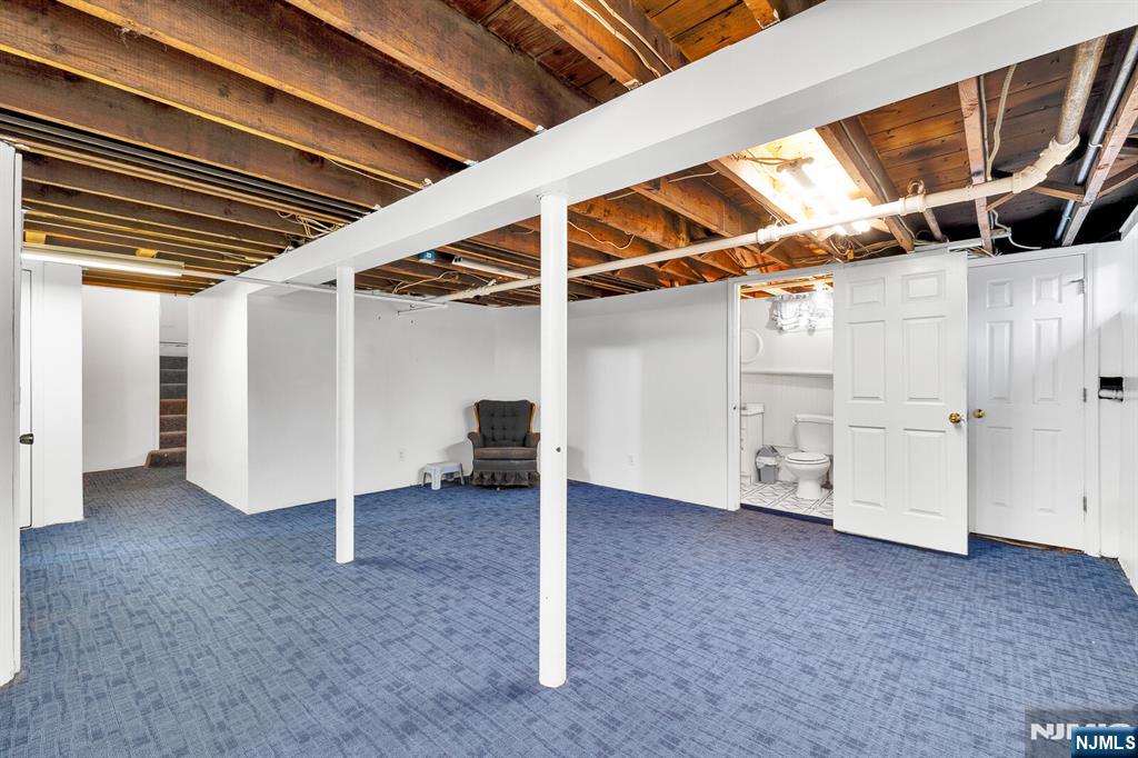 106 Maple Street Rutherford, NJ 07070 - Photo 39 of 50 a view of a room with wooden walls